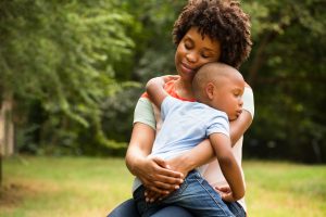 Mother holding child