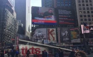 BFair2DirectCare’s billboard in Times Square. Photo Credit: BFair2DirectCare campaign
